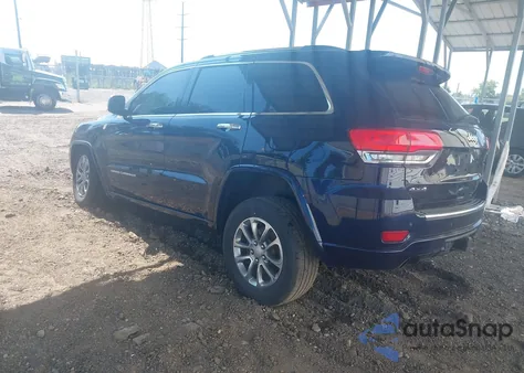 2014 Jeep Grand Cherokee Overland из США, поврежденный, VIN 1C4RJFCTXEC198816